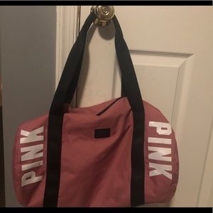 Pink duffel bag.